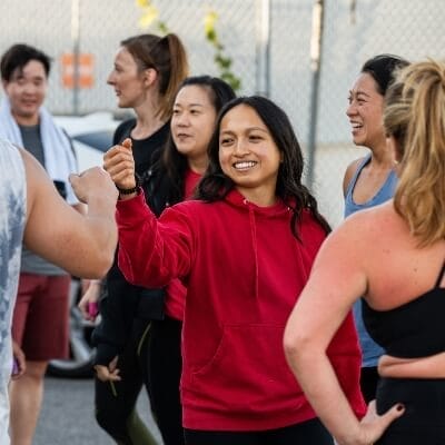 Coaches working with members at Beyond Parallel Fitness Community